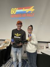 Raffle Prize - Biplane wine rack - Race 69 Michael Laccabue, Bailey Stewart